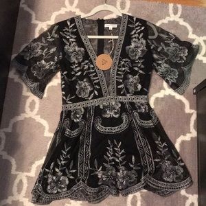 Honey Punch silver mesh plunge romper